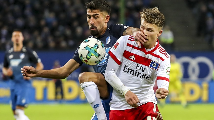 epa06352470 epa06352467 Hoffenheim&#039;s Kerem Demirbay (L) in action against Hamburg&#039;s Jann-Fiete Arp (R) during the German Bundesliga soccer match between Hamburg SV (HSV) and in Hamburg, Germ ...