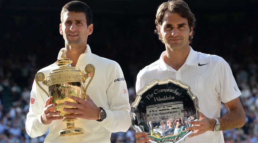 2014: Djokovic und Federer mit ihren Trophäen.