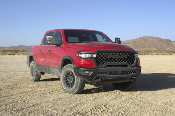 This photo provided by Ram shows the 2025 Ram 1500 Rebel. It features four-wheel drive, Bilstein shock absorbers, an electronic locking rear axle, all-terrain tires and a powerful six-cylinder engine. ...