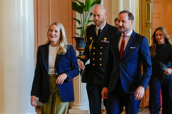 Norway's Crown Princess Mette Marit and Crown Prince Haakon arrive for a reception for Norwegian athletes who competed in the Milan Cortina Paralympics, in Oslo, Friday, April 10, 2026. (Lise Åse ...