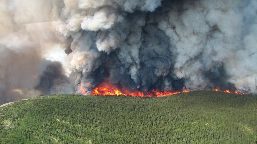 This Tuesday, July 15, 2014 aerial photo provided by Canada&#039;s Wildfire Management Branch shows the Mount McAllister wildfire in the northeastern region of the British Columbia province of Canada. ...
