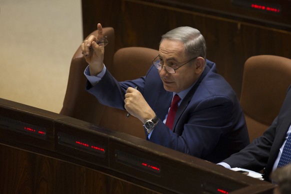 Israeli Prime Minister, Benjamin Netanyahu, gestures during a Knesset, Israel&#039;s Parliament session in Jerusalem, Monday, Oct. 31, 2016. Netanyahu spoke at the opening of the Israeli parliament&#0 ...