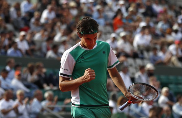 Austria&#039;s Dominic Thiem clenches his fist after winning a point as he plays Argentina&#039;s Horacio Zeballos during their fourth round match of the French Open tennis tournament at the Roland Ga ...