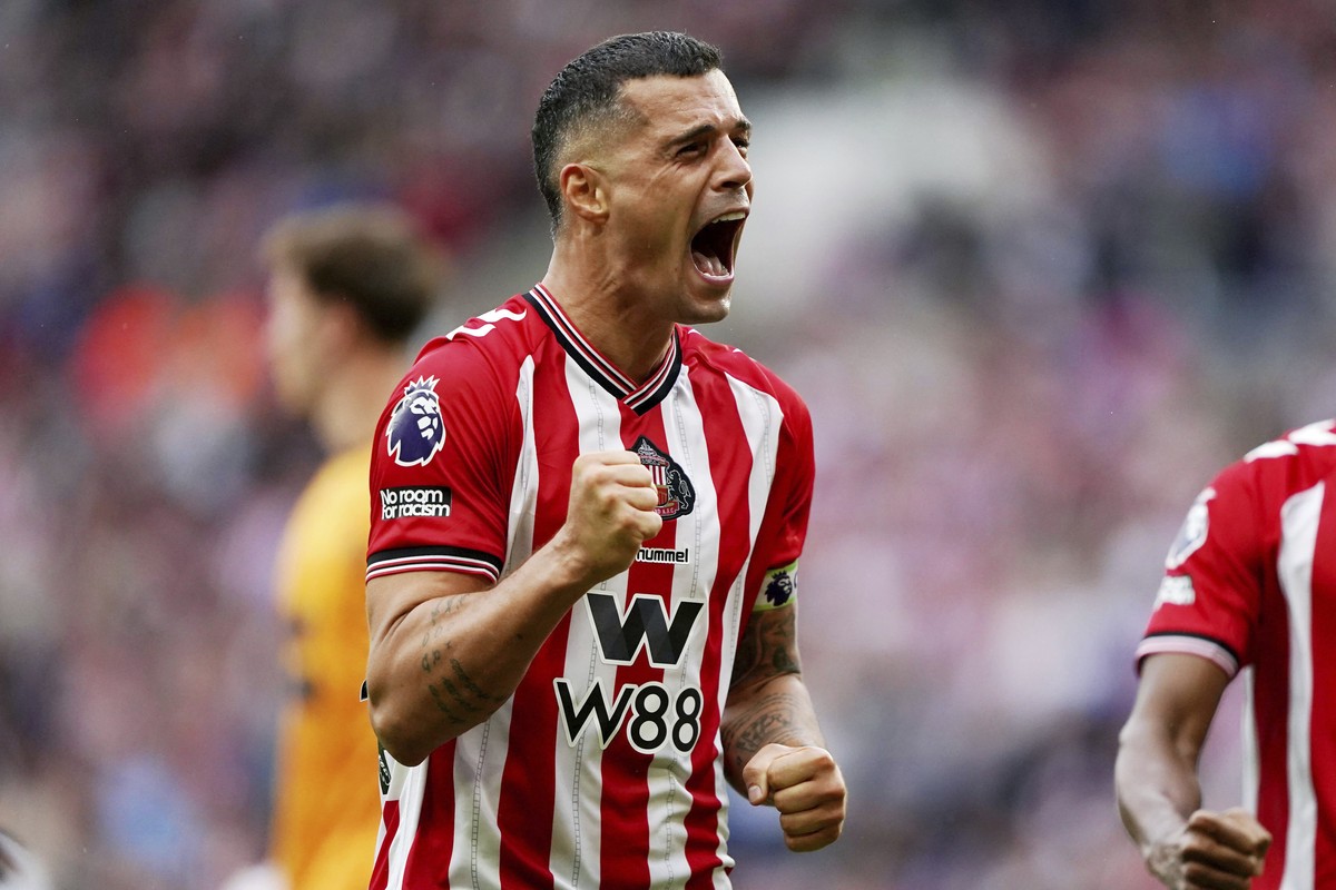 Sunderland's Granit Xhaka celebrates after the English Premier League soccer match between Sunderland and Brentford at the Stadium of Light, Sunderland, England, Saturday, Aug. 30, 2025. (Owen Hu ...