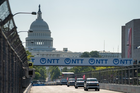 A convey of official vehicles drive down Pennsylvania Avenue ahead of the Freedom 250 Grand Prix auto race, Sunday, Aug. 23, 2026, in Washington. (AP Photo/Allison Robbert)
Freedom 250 IndyCar Trump