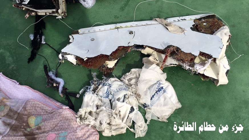 epa05320978 A handout picture made available by the Egyptian Defence Ministry showing pieces of debris from the EgyptAir MS804 flight missing at sea, unspecified location in Egypt, 21 May 2016. The Ar ...