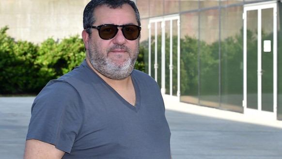 epa07721686 Italian-born Dutch soccer agent Mino Raiola arrives at Juventus Medical Center in Turin, Italy, 17 July 2019. Raiola accompanied his client Dutch defender Matthijs de Ligt who is undergoin ...