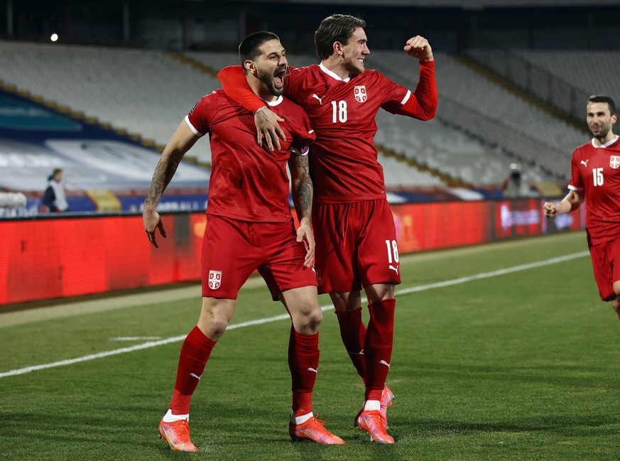 Sport Themen der Woche KW12 Sport Bilder des Tages 210325 -- BELGRADE, March 25, 2021 -- Serbia s Aleksandar Mitrovic L celebrates with his teammate Dusan Vlahovic during the FIFA World Cup, WM, Weltm ...