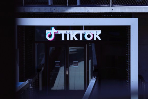 epa11298579 A sign is on display above the entrance of TikTok in Los Angeles, California, USA, 24 April 2024. US President Biden signed on 24 April a law that would ban Chinese-owned TikTok unless it  ...