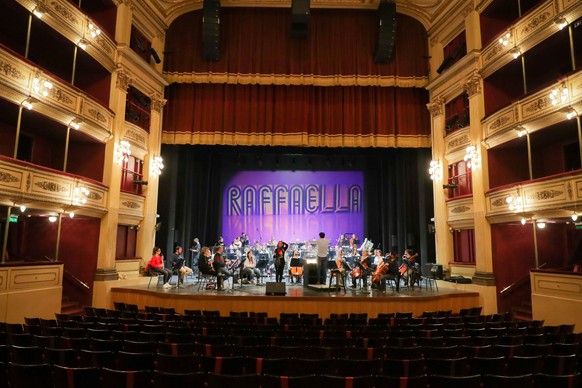 epa09427760 The Montevideo Philharmonic Orchestra rehearses in the Solis Theater in Montevideo, Uruguay, 23 August 2021 (issued 24 August 2021). The Uruguayan Solis Theater dresses up to pay tribute t ...