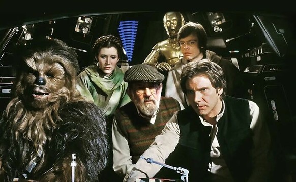 Son makes father appear in well-known films.  At least in theory.