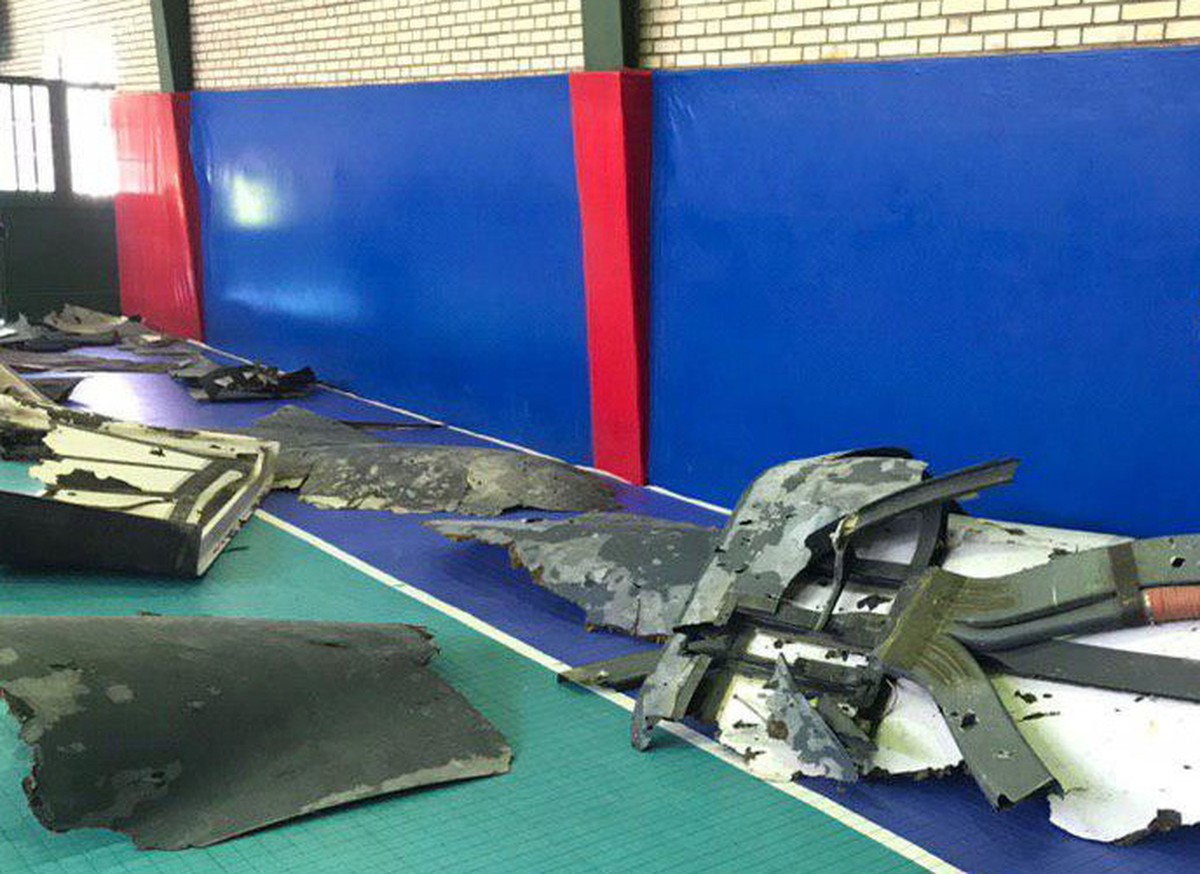 epa07662958 A handout photo made available by Iran's state TV (IRIB) official website shows the wreckage of US drone RQ-4A as in displayed by Iran's Revolutionary guard in Tehran, Iran, 21 J ...