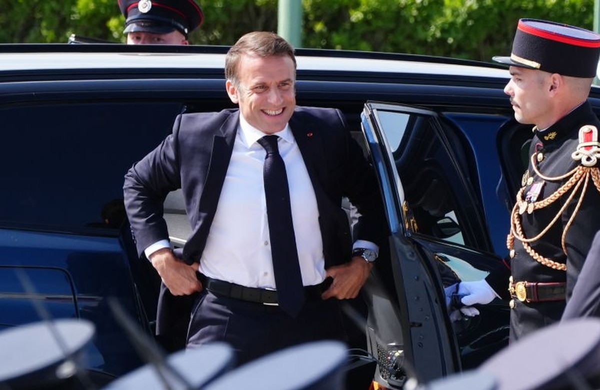 French President Emmanuel Macron arriving ahead of the UK national commemorative event for the 80th anniversary of D-Day, held at the British Normandy Memorial in Ver-sur-Mer, Normandy, France. Pictur ...