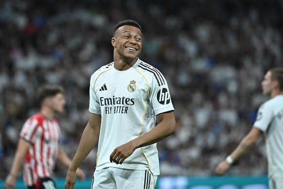 epa12988834 Real Madrid striker Kylian Mbappe celebrates after scoring the team's third goal during the final match of the Spanish LaLiga season between Real Madrid and Athletic Club in Madrid, S ...