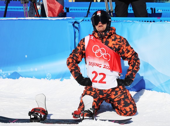 epa09731659 Nicolas Huber of Switzerland in action during the Men&#039;s Snowboard Slopestyle qualification at the Zhangjiakou Genting Snow Park at the Beijing 2022 Olympic Games, Zhangjiakou, China,  ...