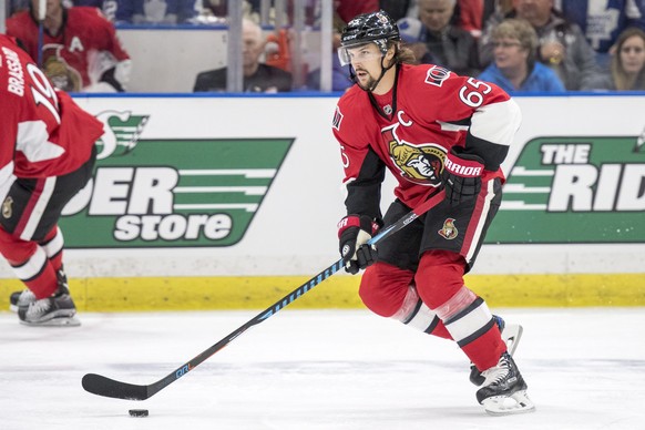 Ottawa Senators defenceman Erik Karlsson moves the puck against the Toronto Maple Leafs during the first period of an NHL preseason hockey game in Saskatoon, Saskatchewan, Tuesday, Oct. 4, 2016. (Liam ...