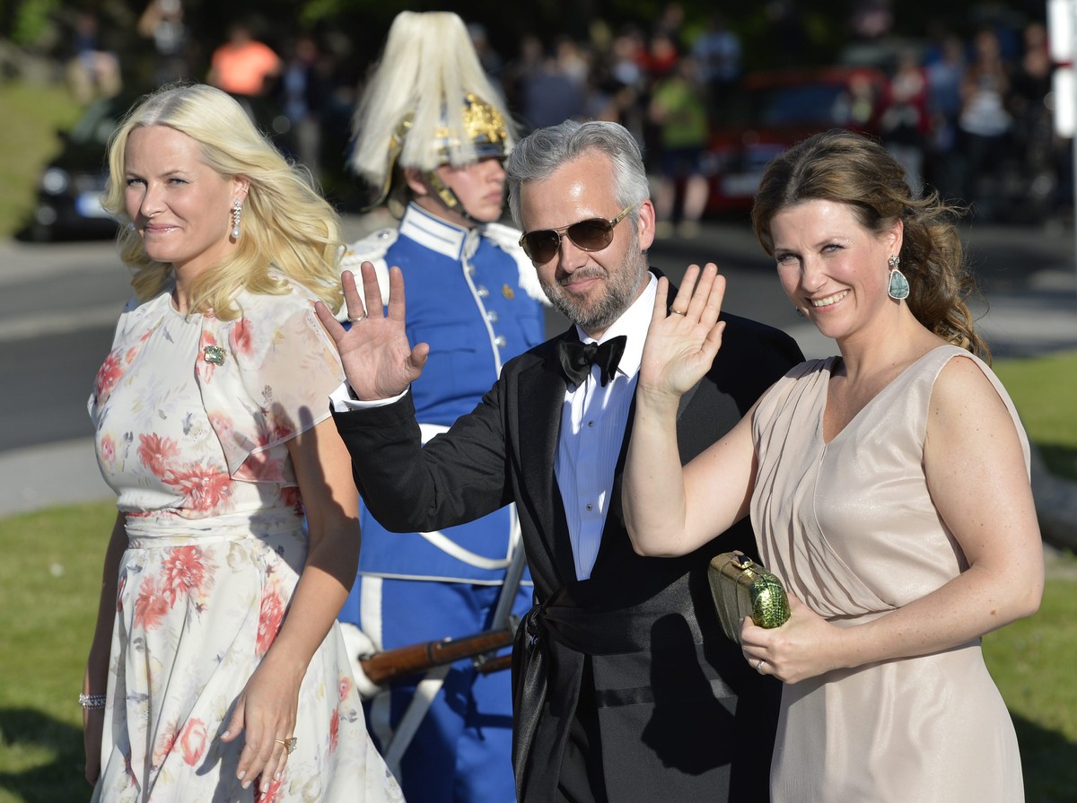 Norway's Crown Princess Mette-Marit, Ari Behn and Princess Martha Louise arrive on Skeppsholmen island after a short boat trip for the pre-wedding party for Prince Carl Philip and his fiancee Sof ...