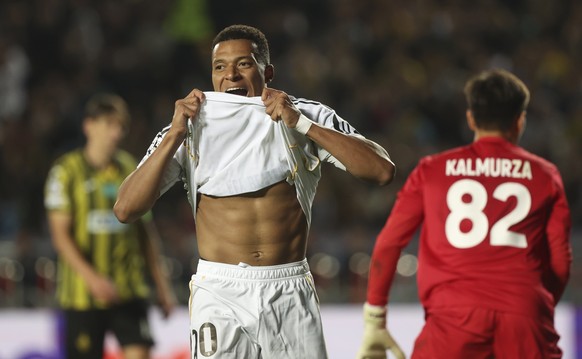 epa12417716 Kylian Mbappe of Real Madrid bites his shirt during the UEFA Champions League soccer match between Kairat Almaty and Real Madrid, in Almaty, Kazakhstan, 30 September 2025. EPA/MAXIM SHIPEN ...