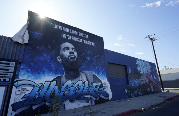 A street mural of the late rapper Nipsey Hussle is pictured, Thursday, June 30, 2022, in the Boyle Heights section of Los Angeles. The many murals of Hussle around Los Angeles speak to the late rapper ...