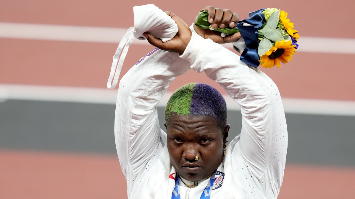 epa09385224 Silver medalist Raven Saunders of the USA during the medal ceremony for the Women's shot put during the Athletics events of the Tokyo 2020 Olympic Games at the Olympic Stadium in Toky ...