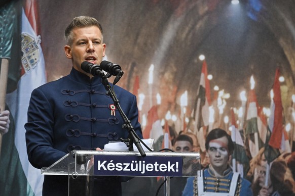 Chairman of the opposition Tisza party Peter Magyar delivers his speech during the celebrations to commemorate Hungary?s 1848 revolution against Habsburg rule in Budapest, Hungary, Saturday, March 15, ...