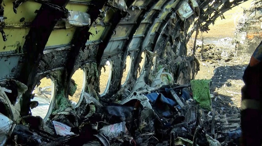epa07550487 A still image taken from handout video footage released 06 May 2019 by the Russian Investigative Committee (Sledcom) shows the burned fragments of the Sukhoi Superjet 100 of the Russian ai ...