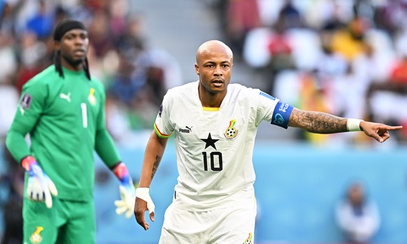 epa10334185 Andre Ayew (R) of Ghana reacts during the FIFA World Cup 2022 group H soccer match between South Korea and Ghana at Education City Stadium in Doha, Qatar, 28 November 2022. EPA/Noushad The ...