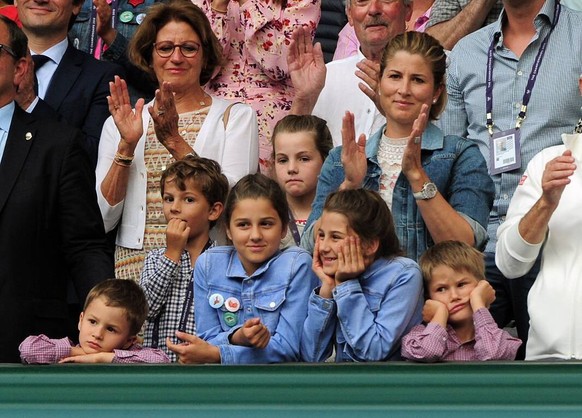 Tennis - 2019 Wimbledon Championships - Week Two, Sunday Day Thirteen Men s Singles, Final: Novak Djokovic SRB vs. Roger Federer SUI Federer s wife Mirka with her dejected children after the match , o ...