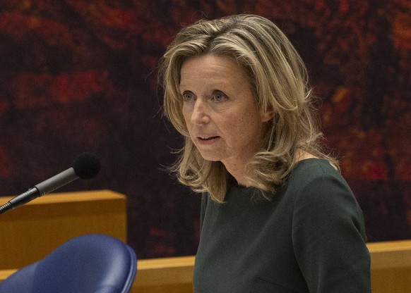 The two officials who led the coalition talks, caretaker interior minister Kajsa Ollongren, right, and Senator Annemarie Jorritsma, left, answer questions of parliament during a debate on caretaker Pr ...