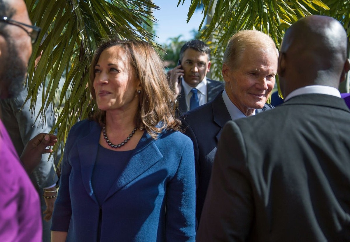 MIAMI, FL - OCTOBER 28: U.S. Sen. Bill Nelson (D-FL) and Sen. Kamala Harris (D-CA) greet people after visiting The Bethel Church on October 28, 2018 in Miami, Florida. Sen. Nelson is locked in a close ...