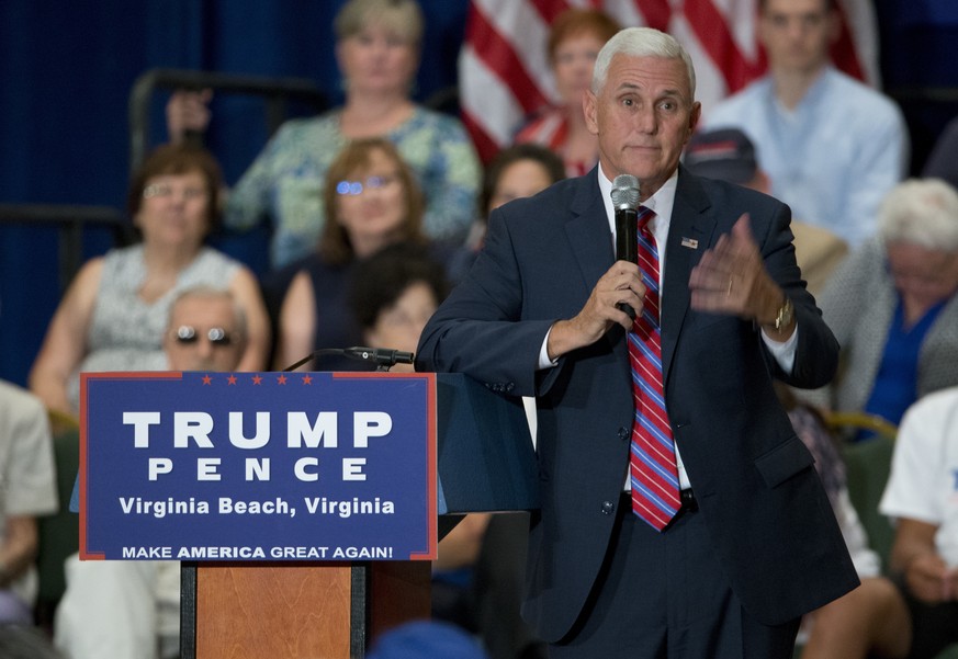 Republican Vice Presidential candidate, Indiana Gov. Mike Pence gestures during a town hall meeting in Virginia Beach, Va., Thursday, Aug. 4, 2016. (AP Photo/Steve Helber)