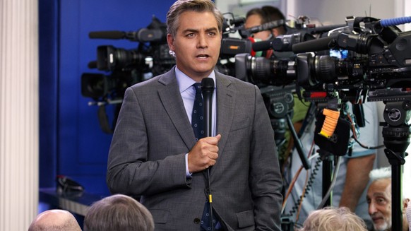 FILE - In this Aug. 2, 2018 file photo, CNN correspondent Jim Acosta does a stand up before the daily press briefing at the White House in Washington. Acosta says President Donald Trump’s attacks on t ...