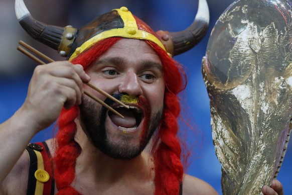 A Belgium fan gestures prior for the start of the match of the round of 16 match between Belgium and Japan at the 2018 soccer World Cup in the Rostov Arena, in Rostov-on-Don, Russia, Monday, July 2, 2 ...