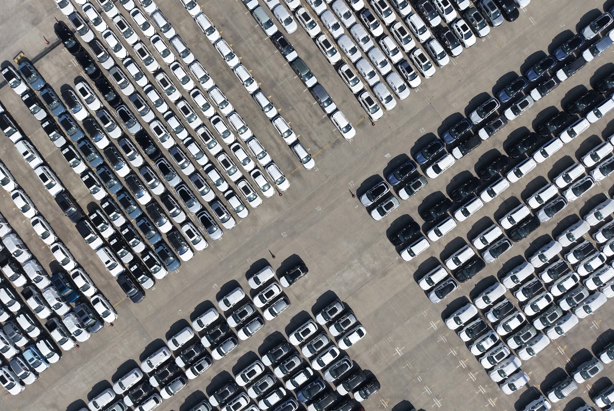 FILE -An aerial view of new cars awaiting export to oversea markets is seen at a port in Shanghai, March 10, 2026. (Chinatopix via AP, File)
China-Auto-Sales