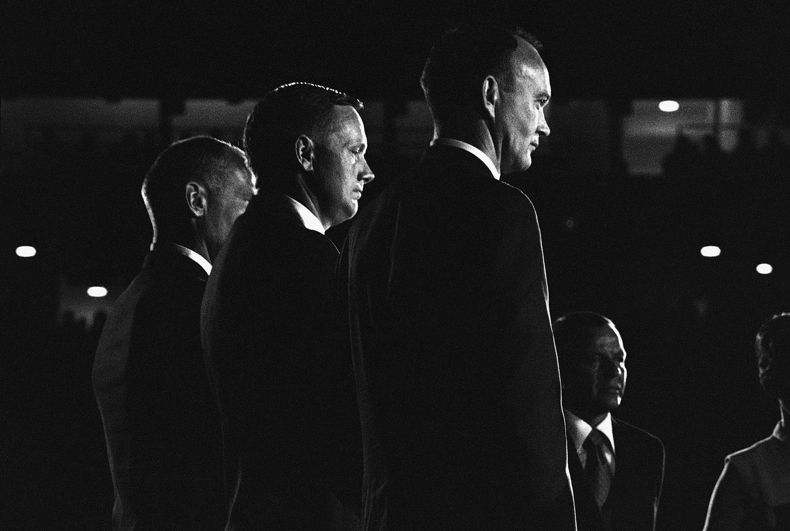 FILE - In this Aug. 16, 1969 file photo, Apollo 11 astronauts, from left, Edwin "Buzz" Aldrin, Neil Armstrong and Michael Collins stand on stage at the Astrodome in Houston, waiting to be pr ...