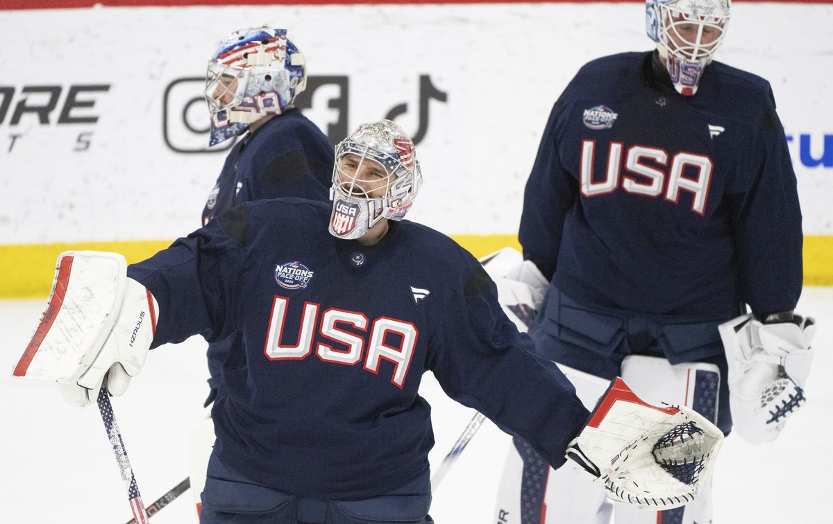 U.S. goaltenders Connor Hellebuyck, centre, Jeremy Swayman, left, and Jake Oettinger on the ice during 4 Nations Face-Off hockey practice in Brossard, Que., on Monday, Feb. 10, 2025. (Christinne Musch ...