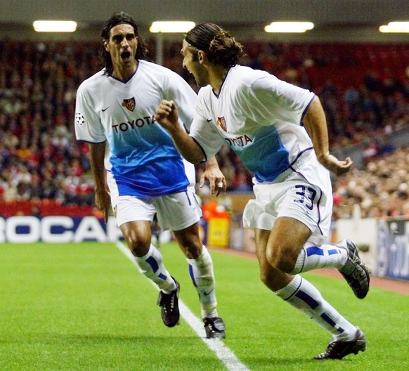 PEN06 - 20020925 - LIVERPOOL, UNITED KINGDOM : FC Basel&#039;s Julio Rossi (R) celebrates after scoring the equalizer to make the score 1-1 against Liverpool with teammate Antonio Esposito (L) on Wedn ...