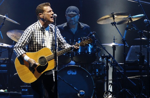 Glenn Frey of the rock group &#039;The Eagles&#039; performs at a concert in honour of Monaco&#039;s Prince Albert II and his fiancee Charlene Wittstock at the Stade Louis II stadium in Monaco in this ...