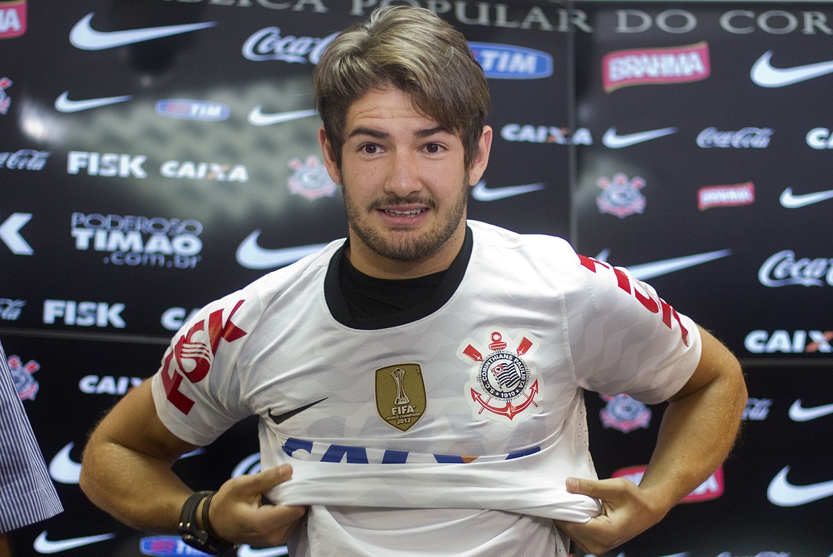 FILE - This is a Friday, Jan. 11, 2013 file photo of former AC Milan striker Alexandre Pato as he poses wearing a Corinthians jersey during his presentation as Corinthians' new soccer player in S ...