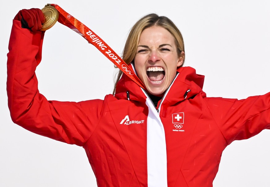 epa09745746 Gold medalist Lara Gut-Behrami of Switzerland celebrates during the victory ceremony of the Women's Super-G race of the Alpine Skiing events of the Beijing 2022 Olympic Games at the Y ...