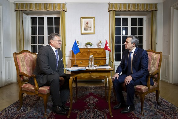 Maros Sefcovic, Executive Vice-President of the European Commission, left, and Swiss Federal Councillor Ignazio Cassis, right, talk during a working visit by Swiss Federal Councillor Ignazio Cassis to ...