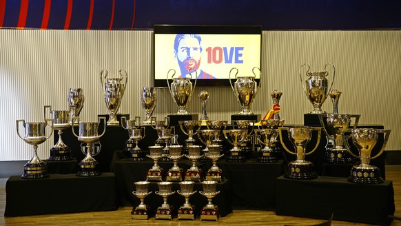 Trophies won while Lionel Messi played for Barcelona are displayed before a press conference at the Camp Nou stadium in Barcelona, Spain, Sunday, Aug. 8, 2021. FC Barcelona had previously announced th ...