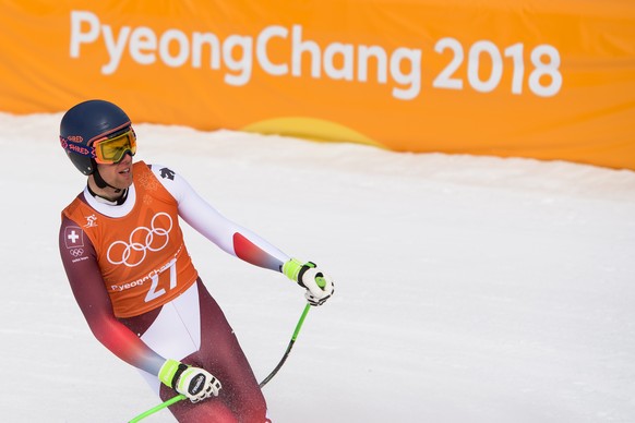 Marc Gisin of Switzerland reacts in the finish area during the men Alpine Skiing downhill training in Jeongseon Alpine Center during the XXIII Winter Olympics 2018 in Pyeongchang, South Korea, on Satu ...