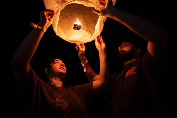 Sky lantern festival held in Pennsylvania PENNSYLVANIA, UNITED STATES - SEPTEMBER 14: A view from Pennsylvania Lantern Lights Festival in Pocono Raceway of Pennsylvania, United States on September 14, ...