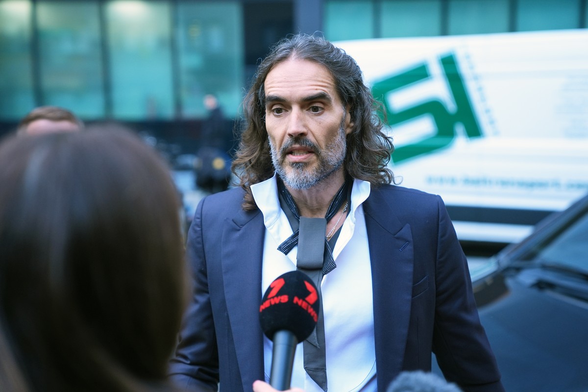 Russell Brand arrives at Southwark Crown Court, London, where he faces three charges of rape, indecent assault, and three counts of sexual assault, relating to six women, on Wednesday Oct. 28, 2026. ( ...