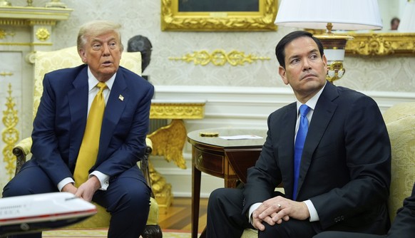 President Donald Trump and Secretary of State Marco Rubio listen during a meeting with Bahrain&#039;s Crown Prince Salman bin Hamad Al Khalifa in the Oval Office of the White House, Wednesday, July 16 ...