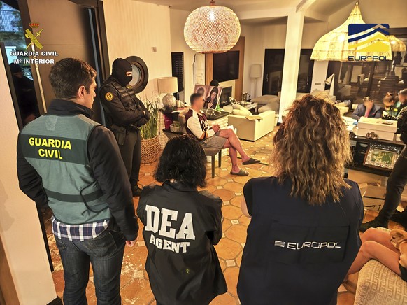 epa10333688 An undated handout photo made available by the Civil Guard, 28 November 2022, shows an operation in cooperation with Europol that has disbanded a cocaine super-cartel in Europe that was ma ...