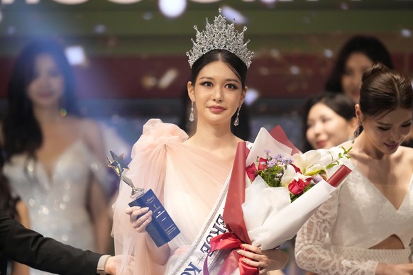 Han Ariel, a 22-year-old fashion school student, celebrates after winning the 2024 Miss Universe Korea in Seoul, South Korea, Monday, Sept. 30, 2024. (AP Photo/Lee Jin-man)