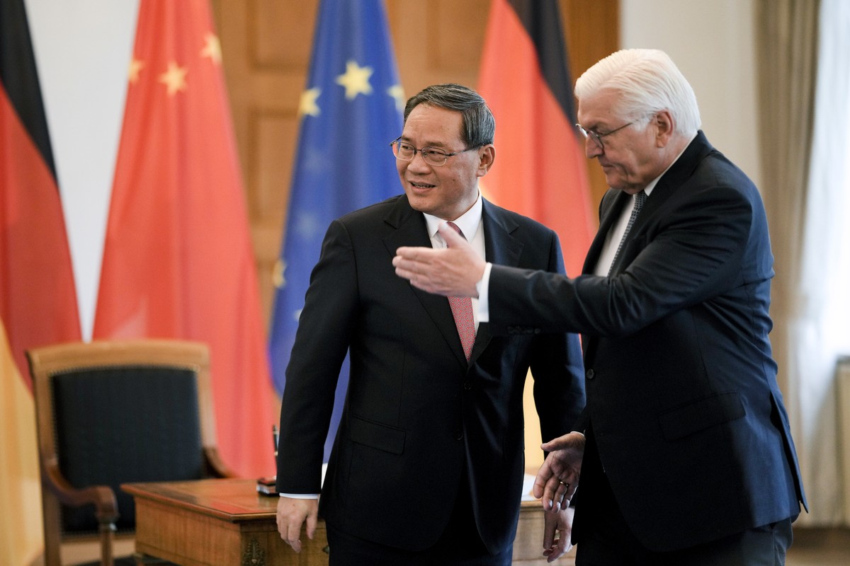 German President Frank-Walter Steinmeier, right, welcomes Chinese Premier Li Qiang for a meeting at Bellevue Palace in Berlin, Germany, Monday, June 19, 2023. Li has started a visit to Germany and Fra ...