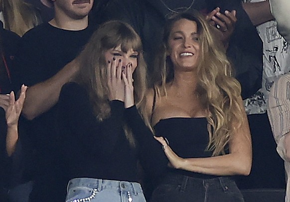 From left, Taylor Swift, Blake Lively and Ryan Reynolds react during the first quarter of an NFL football game between the New York Jets and the Kansas City Chiefs, Sunday, Oct. 1, 2023, in East Ruthe ...